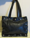 Gorgeous black leather shoulderbag from the Italian luxury fashion house Moschino
